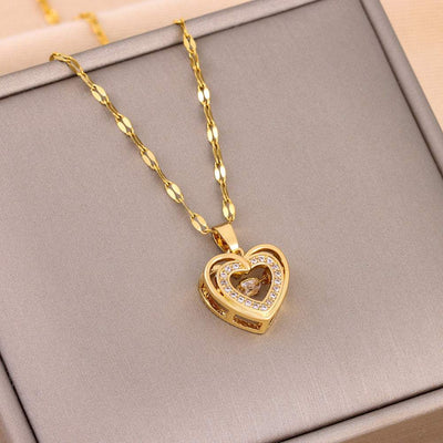 Gold double-layer love necklace with rhinestone heart pendant on twisted chain in jewelry box